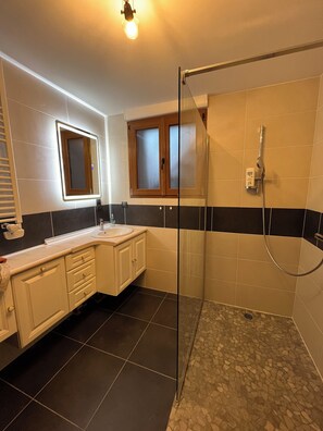 Shower, towels, soap, shampoo