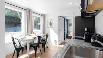 Fridge, microwave, stovetop, coffee/tea maker