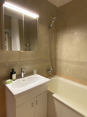 Hair dryer, towels, soap, shampoo