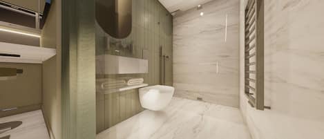 A modern bathroom with a toilet, sink, and shower area.