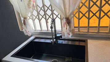 Shower, towels, soap, toilet paper