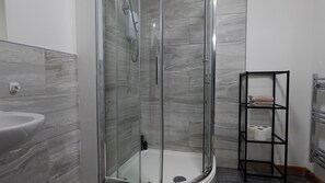 Departamento, vista al jardín | Baño