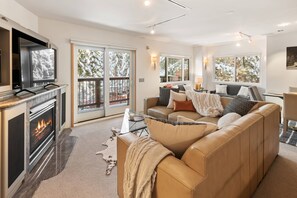 Condo (Dolomite 8) | Living area | 40-inch flat-screen TV with cable channels, fireplace - Dolomite 8 (Aspen)