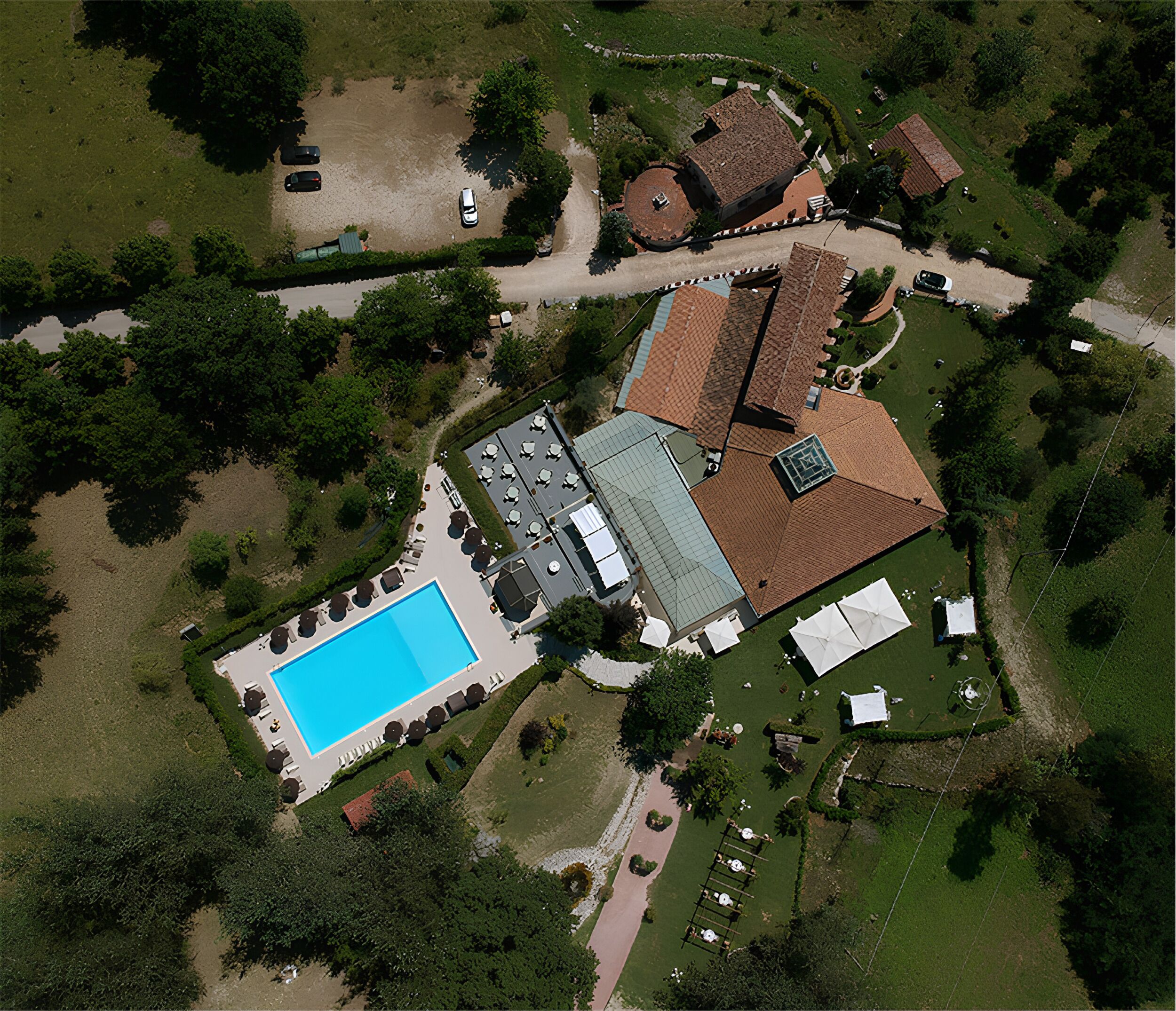 Seasonal outdoor pool, open 10:00 AM to 6:00 PM, pool umbrellas
