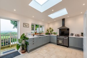 Oven, dishwasher, high chair, cookware/dishes/utensils