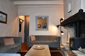 Living area - One-level gîte, enclosed terrace, communal pool, small families (SOYAUX)