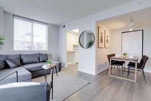 Deluxe Apartment, 2 Bedrooms, Balcony, City View | Living area | 45-inch plasma TV with cable channels