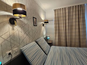 1 habitación, tabla de planchar con plancha, wifi y ropa de cama