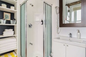 Shower, hair dryer, shampoo