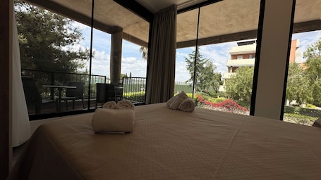 Deluxe Apartment, Garden View | 1 bedroom, individually furnished, desk, laptop workspace