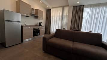 Apartamento luxo, vista para o jardim | Cozinha privada | Mesas de jantar