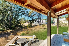 Outdoor dining - Dramatic ocean-view home with hot tub, gorgeous patios, pools, saunas, WFH desks (Sea Ranch)