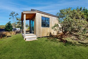 Exterior - Dramatic ocean-view home with hot tub, gorgeous patios, pools, saunas, WFH desks (Sea Ranch)