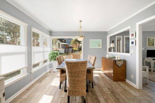 Pet-friendly 3BR beach cottage with fenced yard, wood stove, and easy beach access.