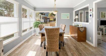 Pet-friendly 3BR beach cottage with fenced yard, wood stove, and easy beach access.