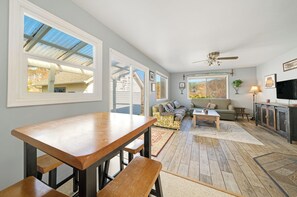 TV, fireplace, offices - Pet-friendly 3BR beach cottage with fenced yard, wood stove, and easy beach access. (Rockaway Beach)