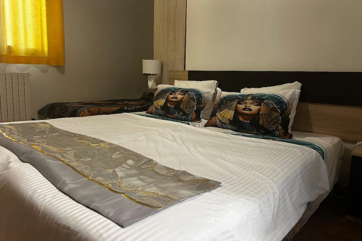 Junior Triple Room, Garden View | Dihias secara berasingan, kalis bunyi, Wi-fi percuma