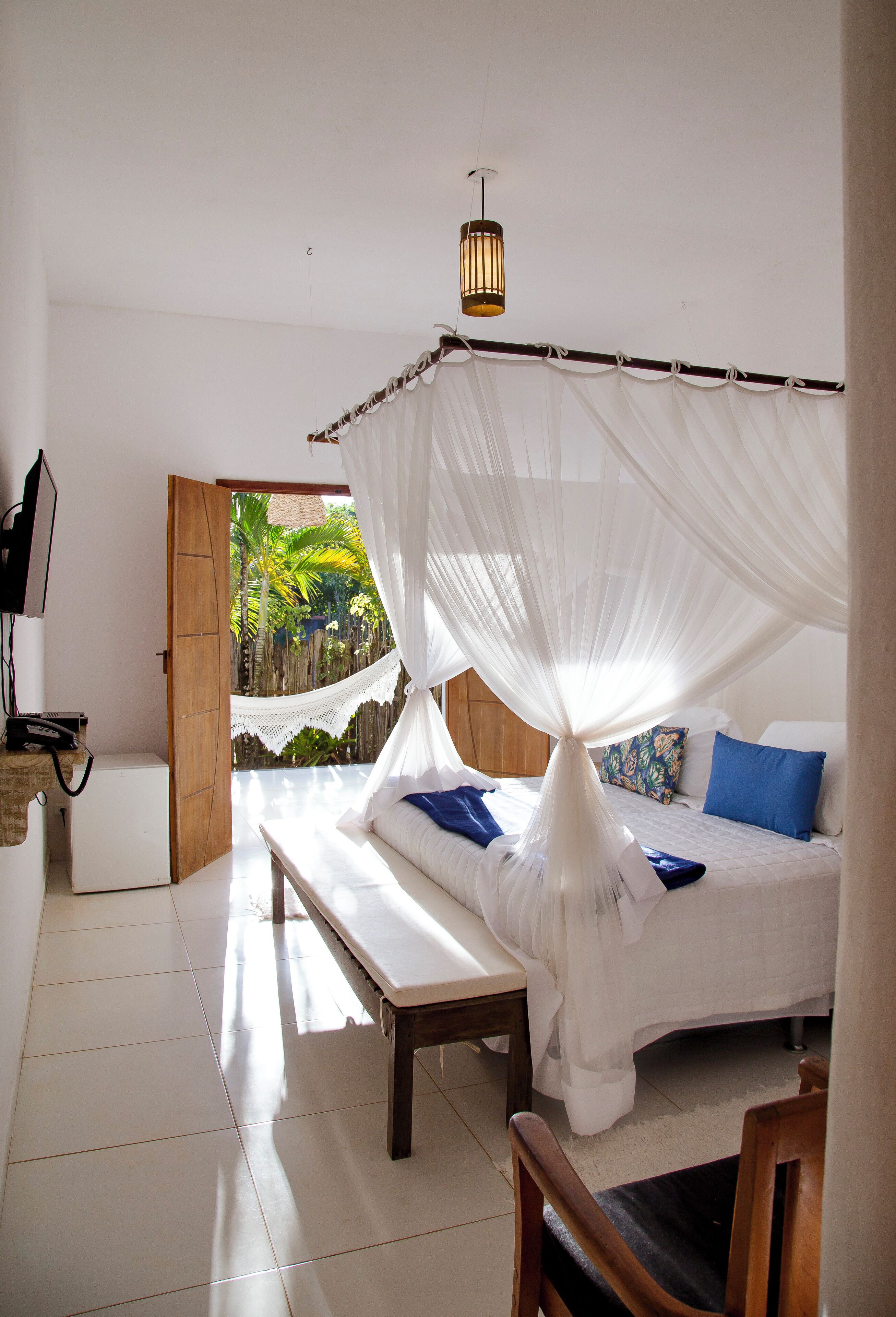 Standard Suite, Lanai, Garden View | In-room safe, individually decorated, bed sheets