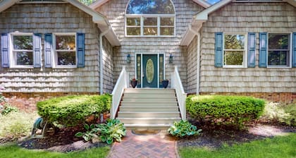 Stunning lakefront retreat w/firepit, game room, & water views