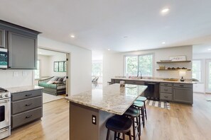 Fridge, microwave, oven, stovetop - Stunning lakefront retreat w/firepit, game room, & water views (Bumpass)