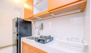 Apartament | Cuina privada | Frigorífic, placa de cuina i arrossera 