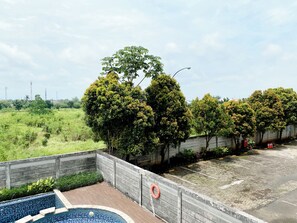 Studio | View from room - Comfy Studio With Twin Bed At Enviro Apartment (Cikarang)