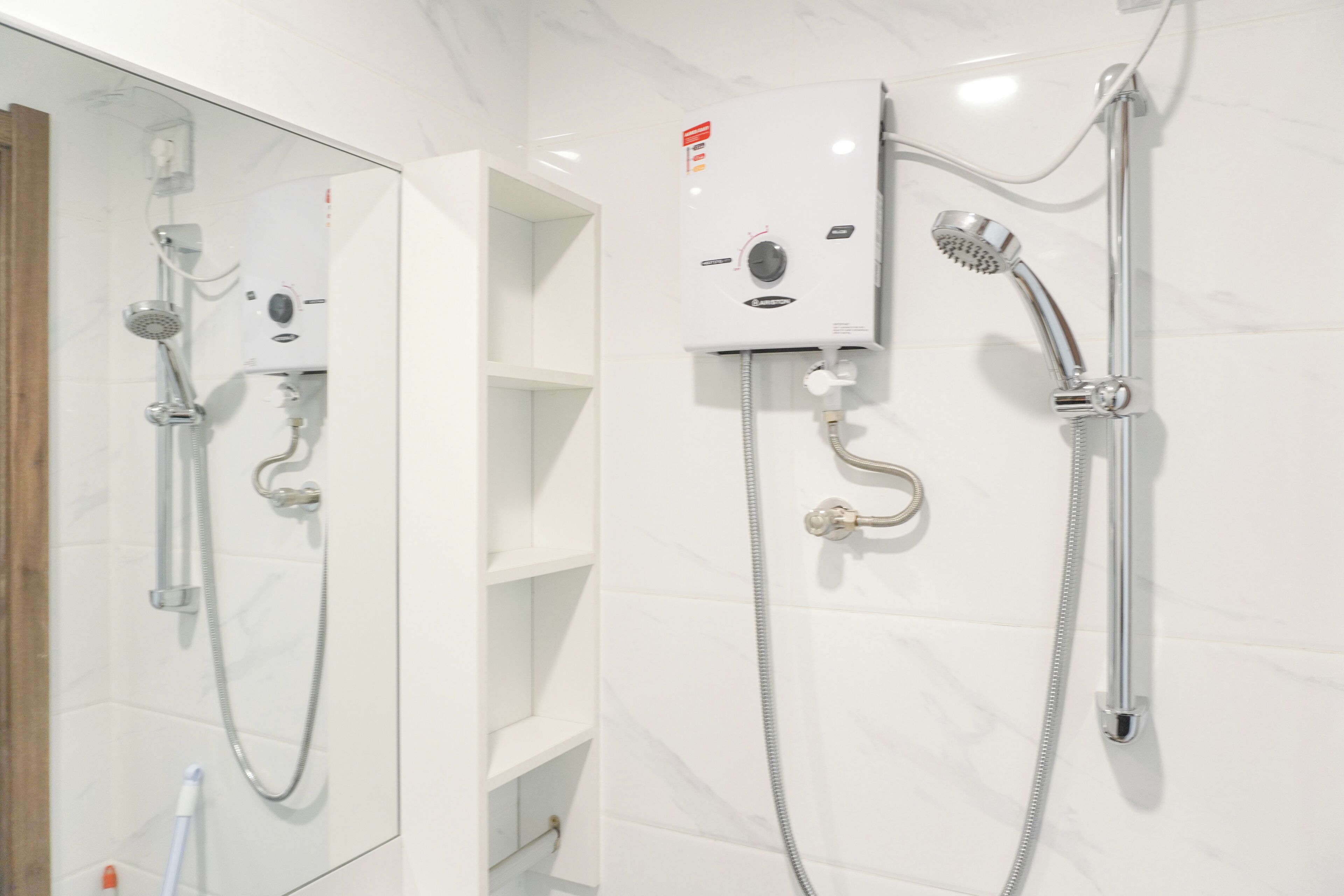 Estudio | Baño | Regadera y toallas 