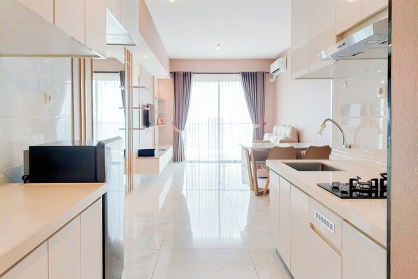 Private kitchen - Homey 3Br Sky House Bsd Apartment Next To Aeon Mall (Pagedangan)