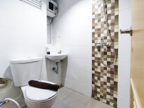 Studio | Bathroom | Shower, towels - Good Choice And Homey Studio At The Alton Apartment (Semarang)
