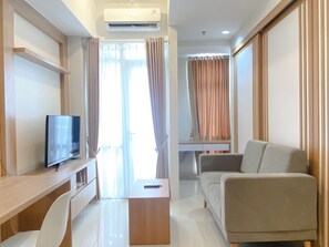 Living area - Best Deal And Restful 1Br Vasanta Innopark Apartment (Cikarang)