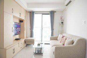 Apartment | Living area - Restful And Modern 3Br At Daan Mogot City Apartment (Jakarta)