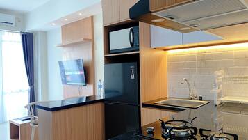 Apartment | Private kitchen | Full-size fridge, microwave, stovetop