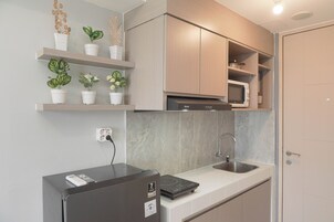 Studio | Private kitchen | Full-size fridge, microwave, stovetop, electric kettle