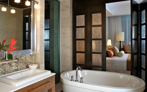 Combined shower/tub, hair dryer, towels, soap