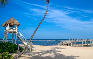 Private beach, white sand, free beach shuttle, 2 beach bars