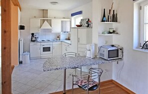 Fridge, microwave, stovetop, cookware/dishes/utensils