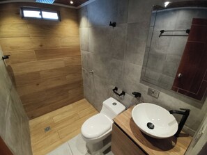 Shower, towels, soap, toilet paper