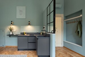 Fridge, microwave, stovetop, coffee/tea maker