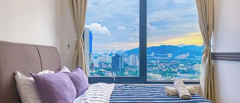 Deluxe Condo, 2 Bedrooms, City View | 1 bedroom, blackout curtains, iron/ironing board, free WiFi