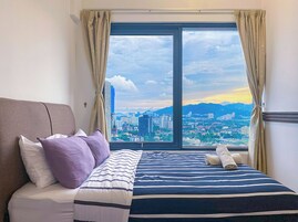 Deluxe Condo, 2 Bedrooms, City View | Blackout drapes, iron/ironing board, free WiFi, bed sheets