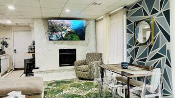 Smart TV, fireplace, books