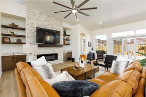 Smart TV, fireplace, table tennis, books