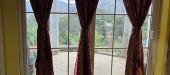 O-T on the rise Bed and Breakfast, three miles away from the Blue Mountain Peak.