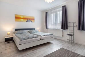 2 dormitorios, tabla de planchar con plancha, wifi gratis y ropa de cama