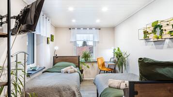 4 slaapkamers, een strijkplank/strijkijzer, gratis wifi, beddengoed