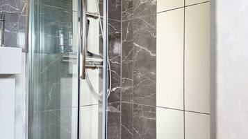 Hair dryer, towels, soap, toilet paper