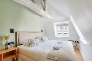1 dormitorio, tabla de planchar con plancha, cuna de viaje y wifi