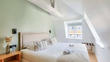 1 habitación, tabla de planchar con plancha, cuna de viaje y wifi