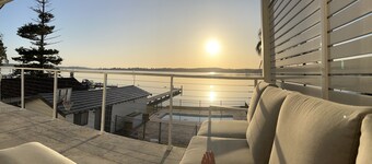 Sparkle by the Lake at this peaceful direct waterfront luxury home