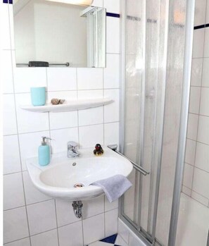 Douche, sèche-cheveux